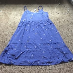 An extra large light blue floral dress,